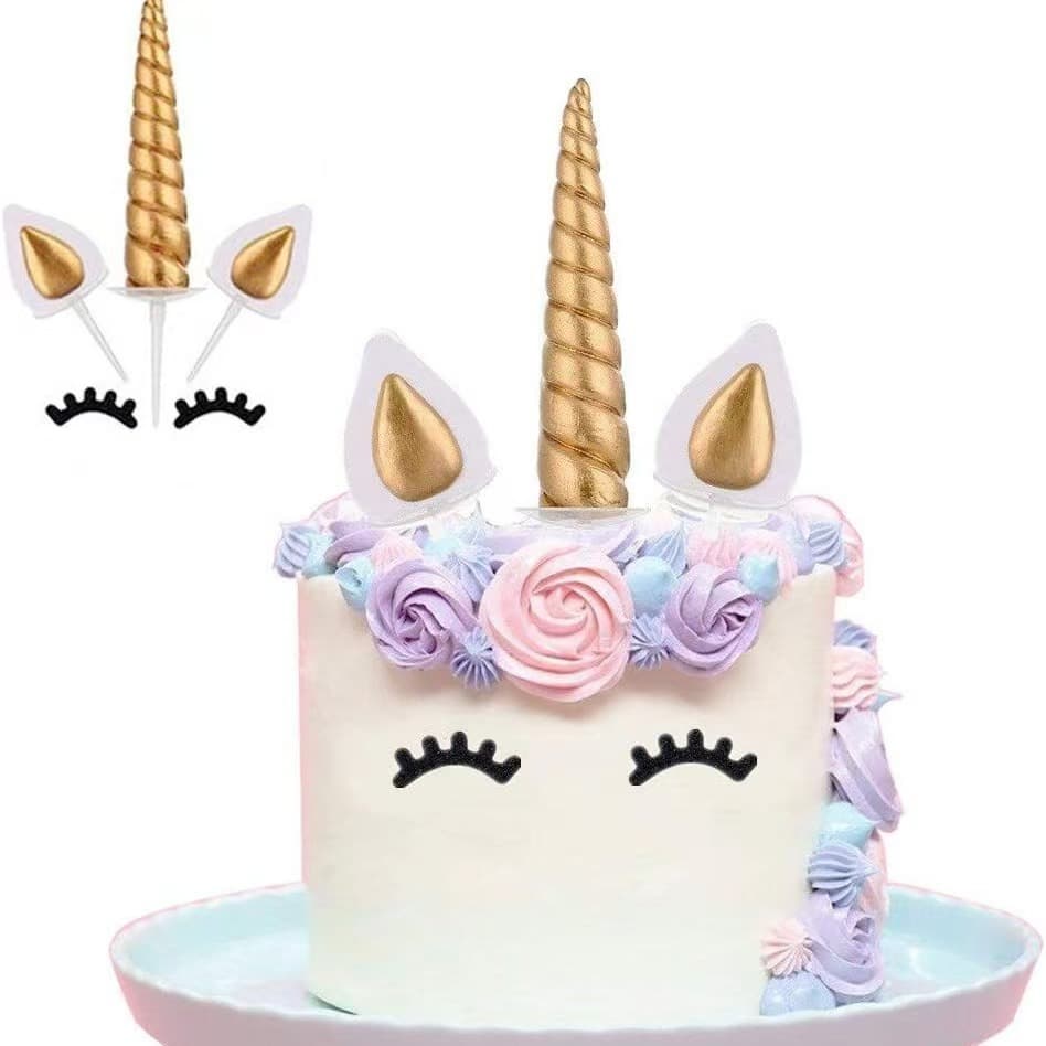Unicorn cake decoration set with 3D polymer clay horns, ears, and eyes; baking decoration inserts; dessert table setting.