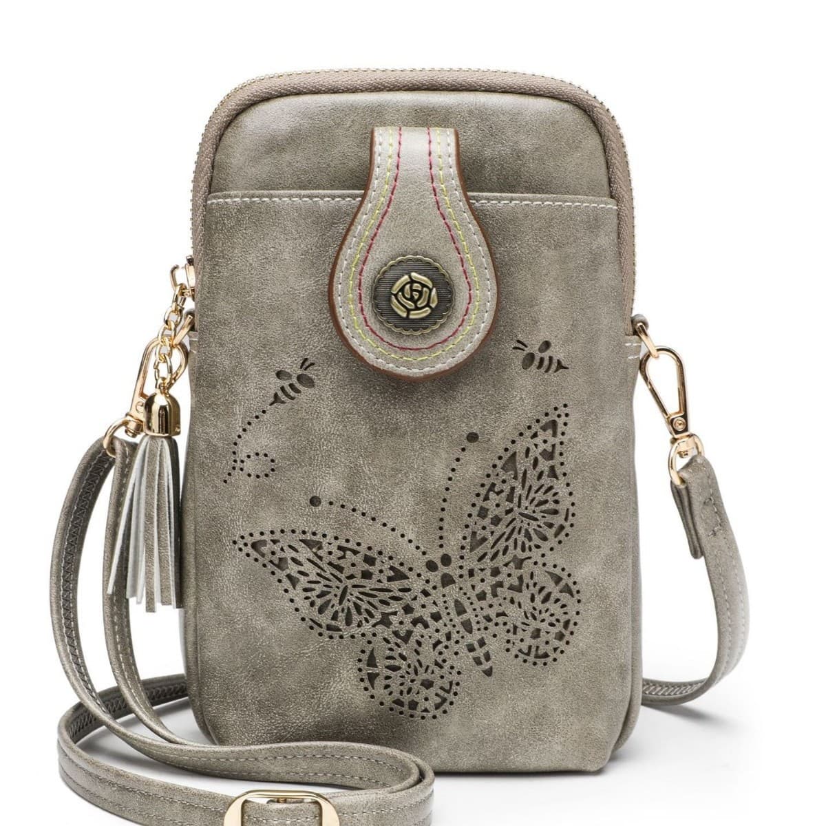 An Fuman hand carry new cross-border hot-selling PU phone bag, fashionable stylish Korean-style hollow carved women's factory