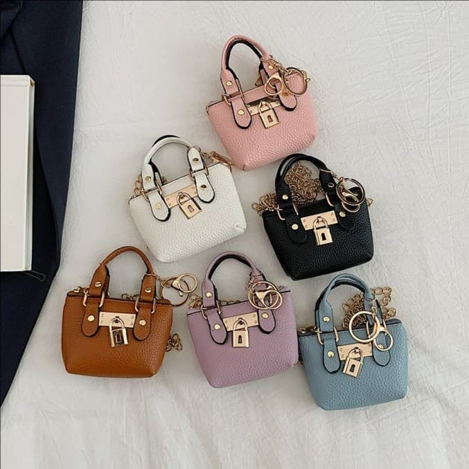 Korean style girls' cross-body hand-held small square bag 2026 summer new personality classic children's hand-held single shoulder cross-body bag