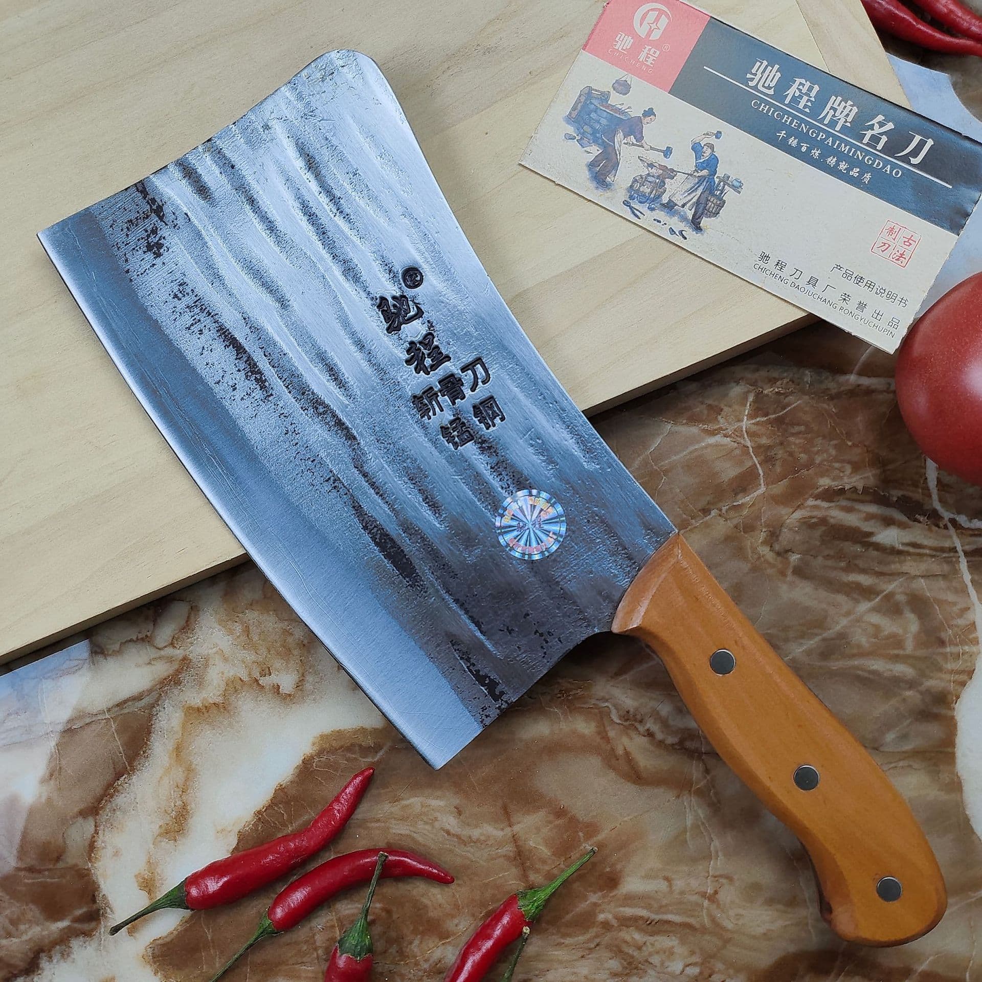 Chicheng hammer-patterned cleaver, made of manganese steel and forged, is a kitchen knife, chef's knife, and gift knife.