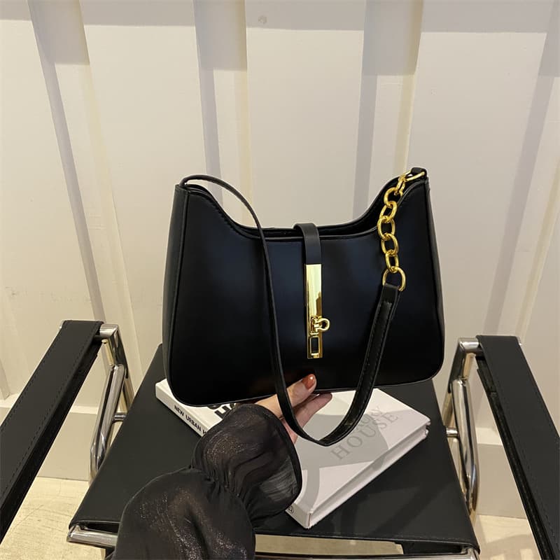Korean niche design bag for women 2025 spring and summer new style textured portable armpit bag, versatile and fashionable shoulder bag