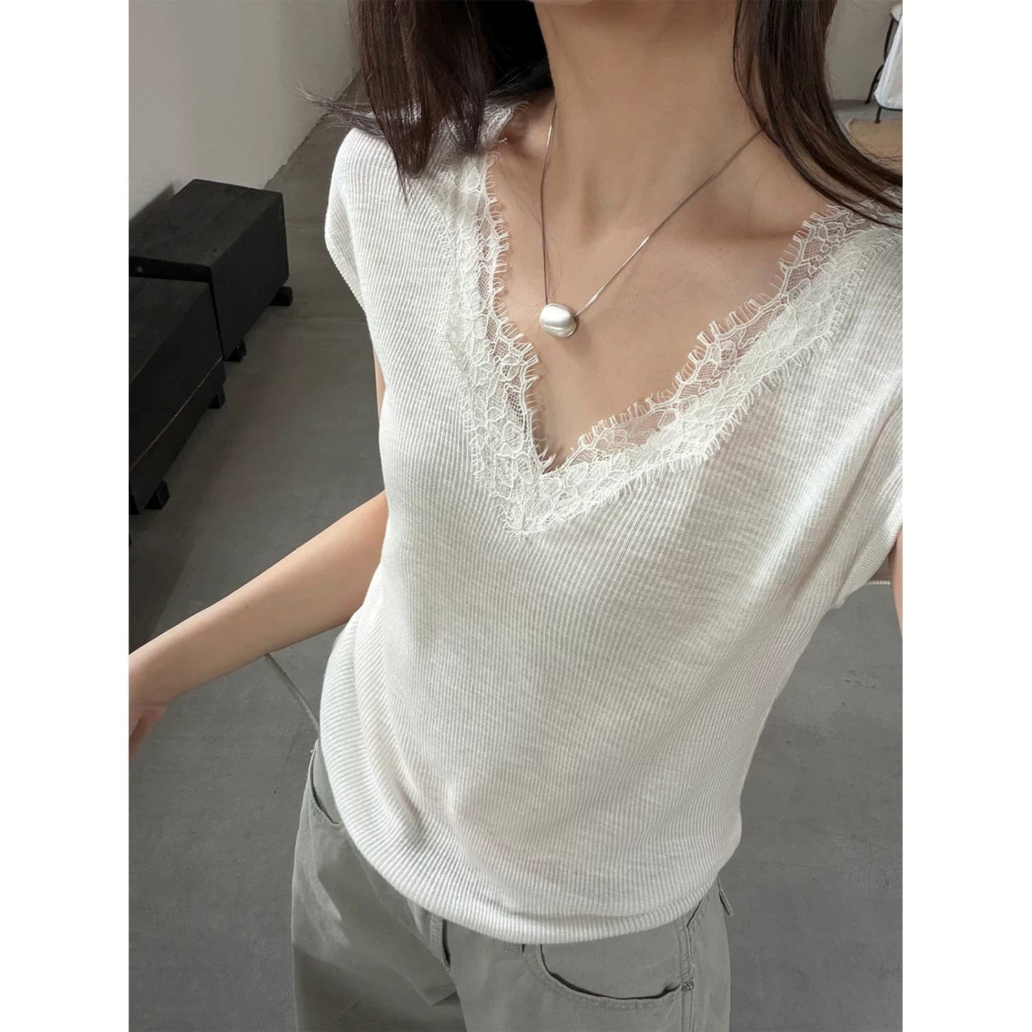 Summer atmosphere, gentle and slim V-neck lace splicing small flying sleeves sweater for women 2026 new style