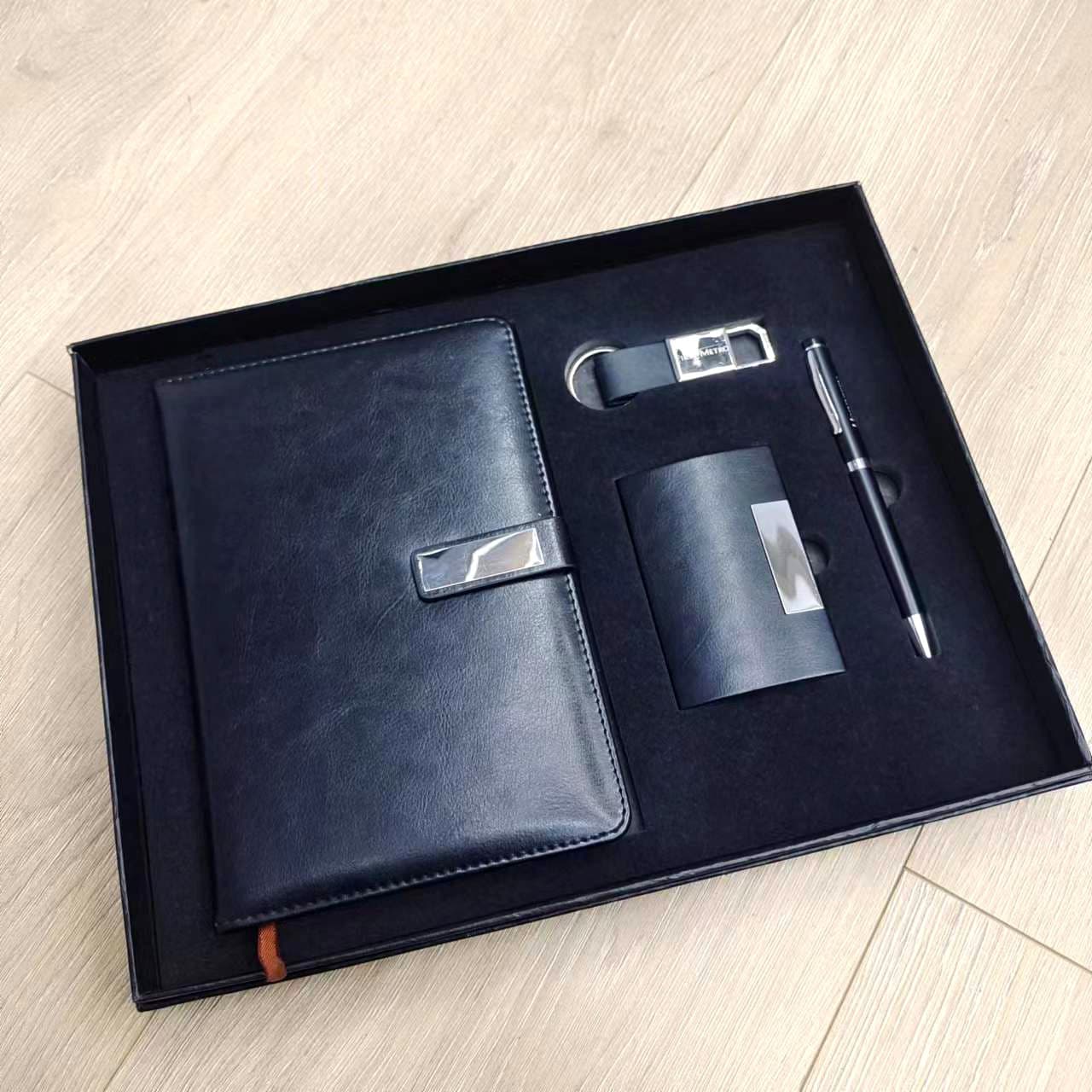 Black Business Gift Set: Notebook, Card Holder, Ballpoint Pen, and Promotional Keychain