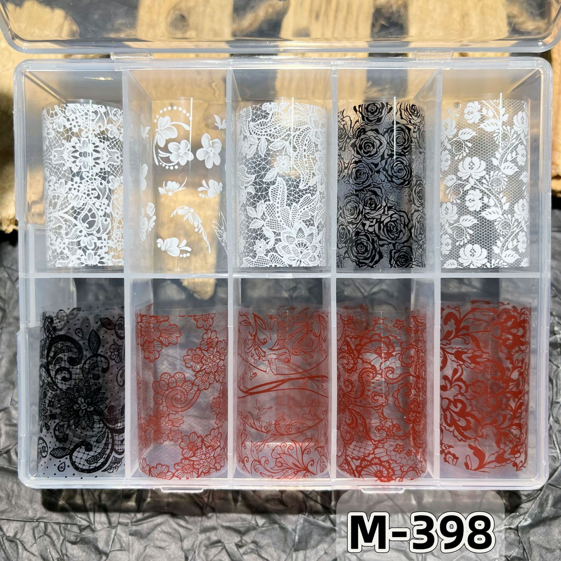 New nail art designs featuring burgundy lace, black and white lace flower stickers, transfer stickers, and hand-painted nail art stickers.