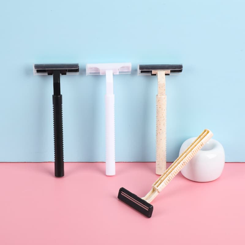 Hotel-specific disposable manual razors with eco-friendly straw handles