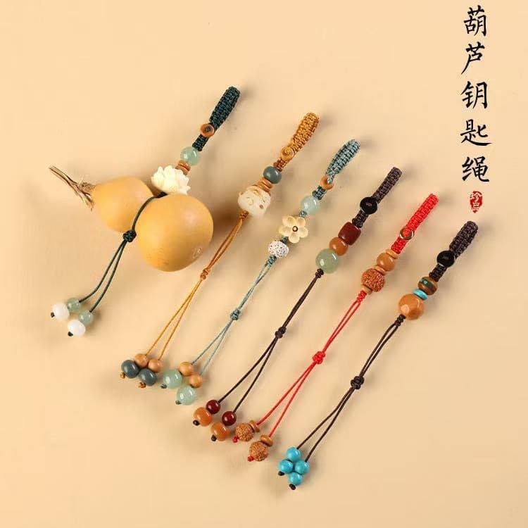 Wholesale gourd hanging ropes, hand-woven gourd keychain semi-finished products, cinnabar bodhi car keychains.