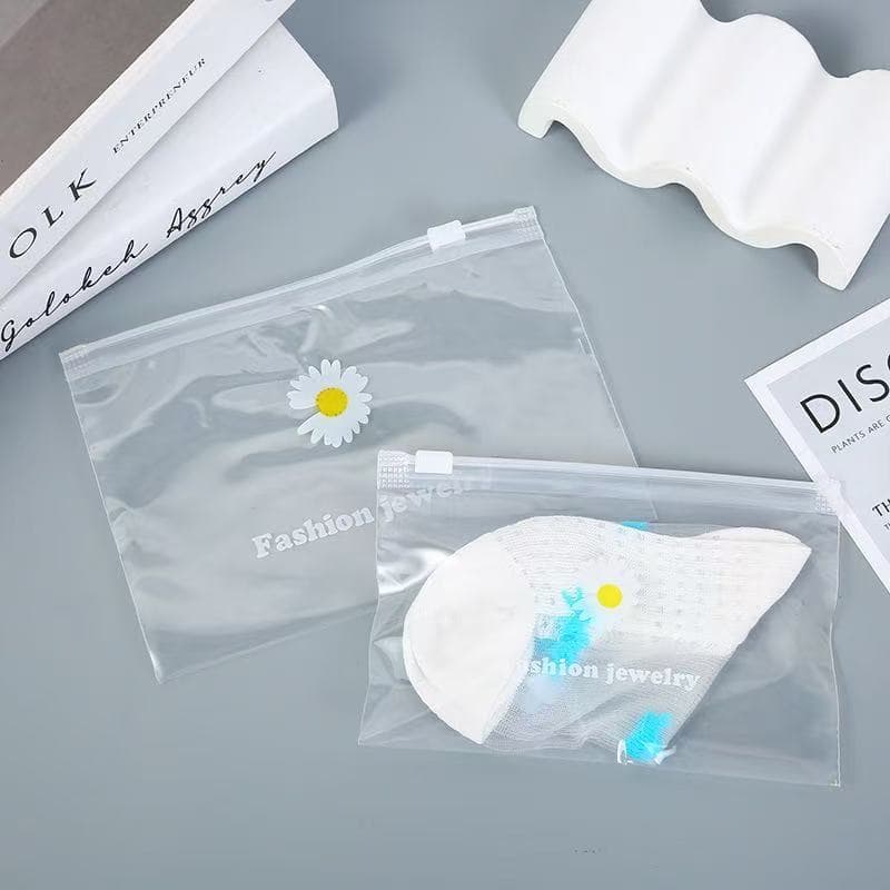 Fresh and elegant daisy transparent plastic self-sealing bags, hair accessory bags, jewelry packaging bags, factory direct wholesale, sealed.