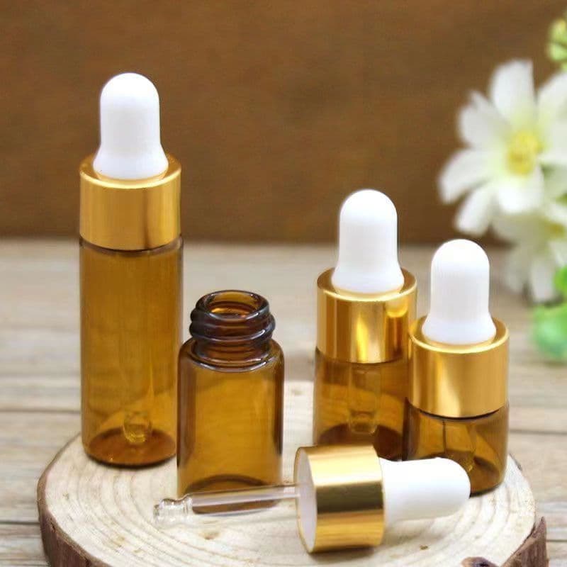 Amber small trial size empty bottle with rubber-tip dropper, portable light-proof transparent bottle with gold ring black (white) rubber head