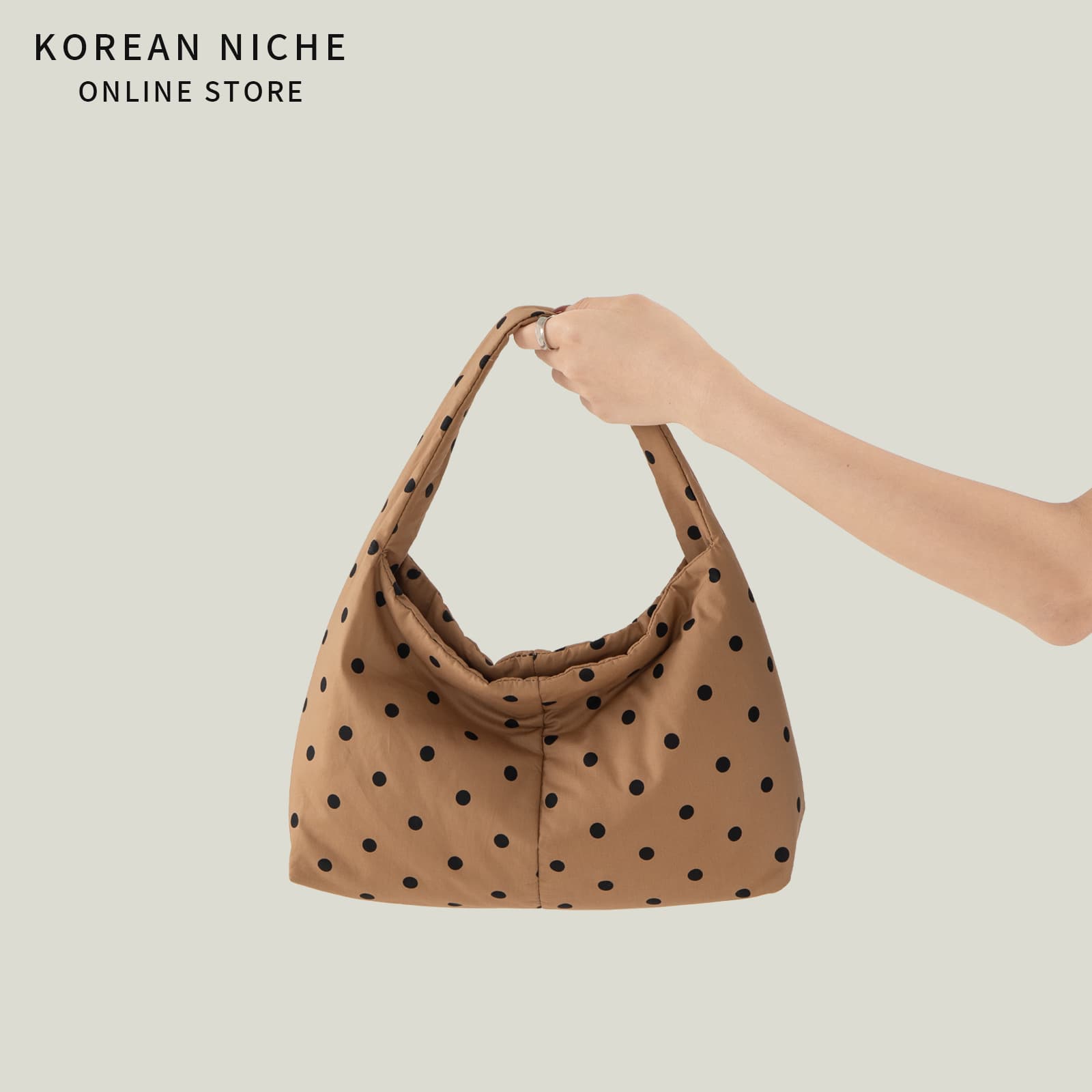 2026 super hot polka dot design handbag women's Korean version new high-end lightweight and versatile commuter fashion handbag