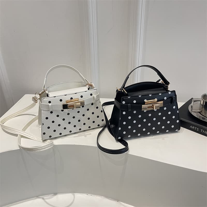 Retro polka dot mini Kelly bag for women, new French hand-held crossbody bag, niche exquisite mini mobile phone bag