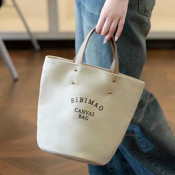 Fashion Handheld Bucket Bag, 2025 New Korean Minimalist Artistic Shoulder Bag, Commuter Crossbody Bag with Logo Printing Option