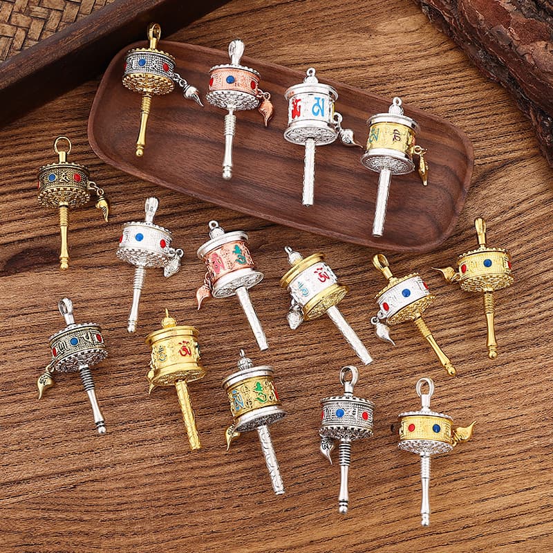 Tibetan-style alloy dripping six-syllable mantra prayer wheel pendant, ethnic style prayer wheel keychain wholesale