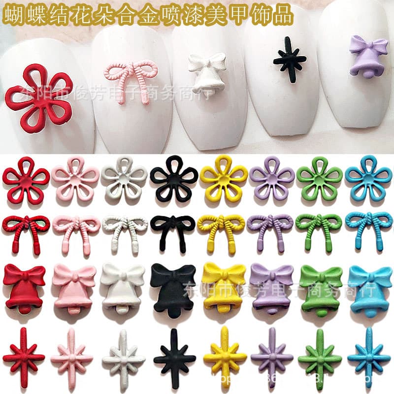 Macaron-Colored Hollow Flower Alloy Nail Art Decorations, Trendy Spray-Painted Christmas Bow and Bell Nail Stickers Wholesale