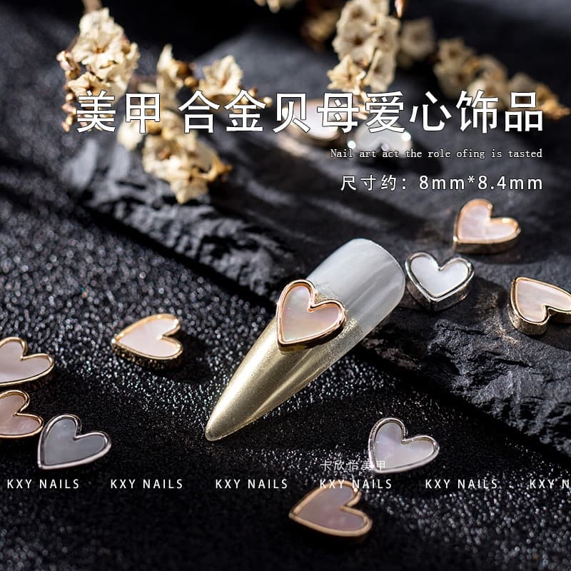 Nail art trinkets alloy love mother-of-pearl genuine peach heart nail accessories simple light luxury Internet celebrity diamond jewelry new style