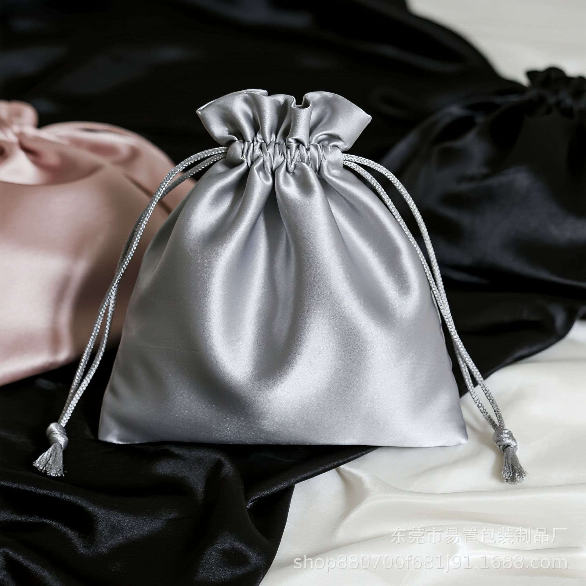 Premium silver-gray satin drawstring bag, silk satin storage bag with logo printing, smooth accessory drawstring pouch.