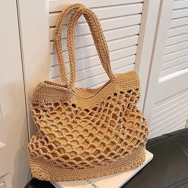 Large Capacity Handheld Beach Bag for Women 2026 New Crochet Hollow Knitted Bag Casual Versatile Shoulder Underarm Bag