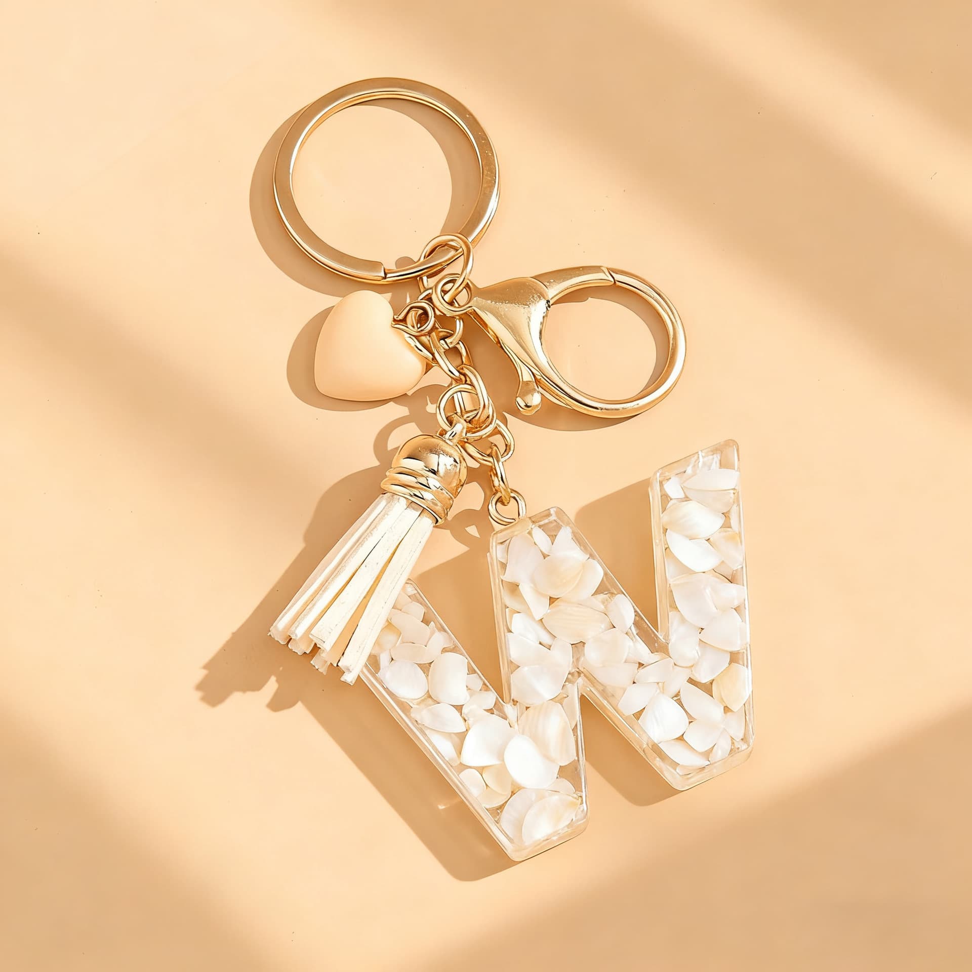 New Cross-Border Beige Heart Epoxy Alphabet Fashion Keychain with Beige Tassel Bag Charm Accessory