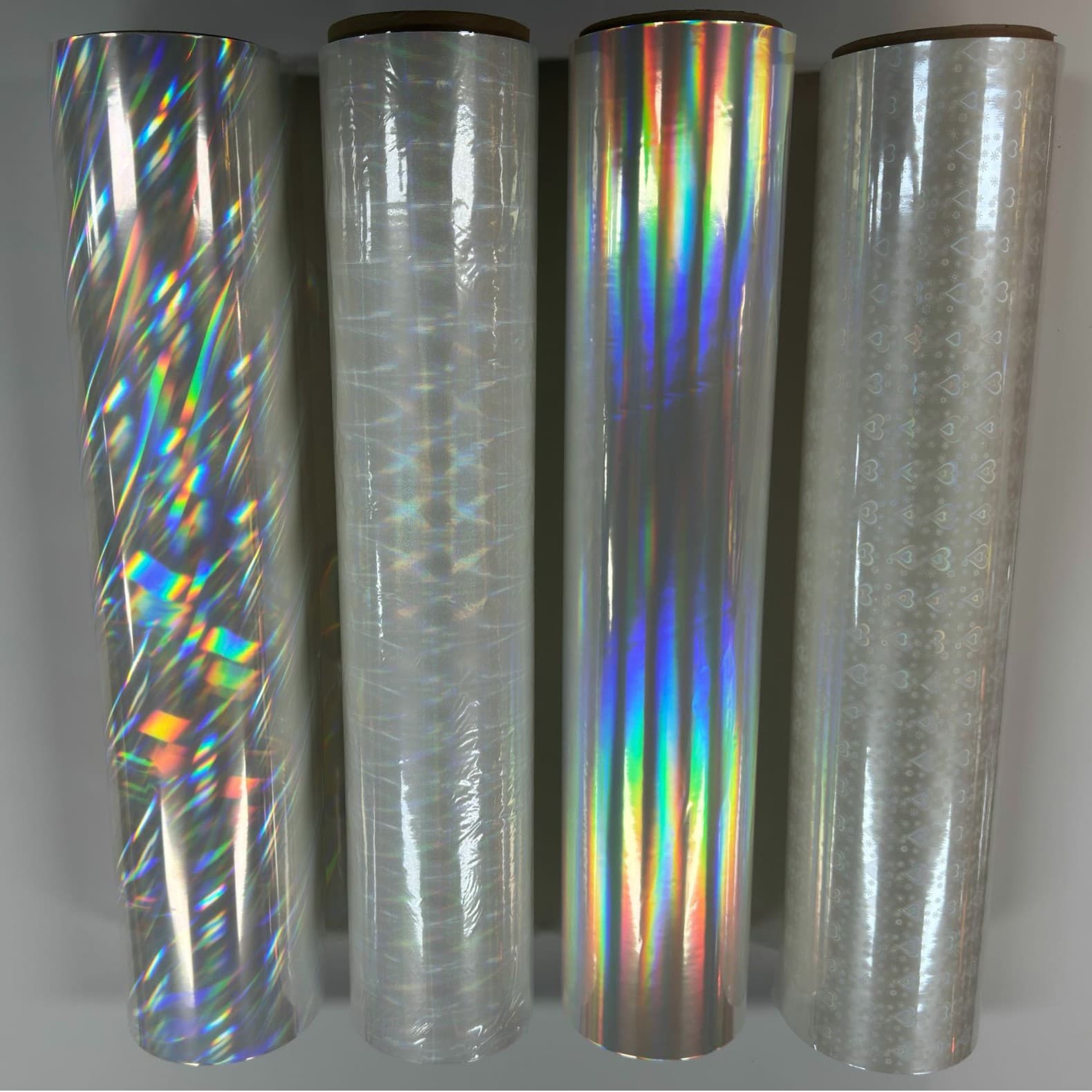 Pre-coated film, BOPP film, high-viscosity packaging paper products, digital quick printing, lamination, anti-laser film, heat-sensitive digital product.