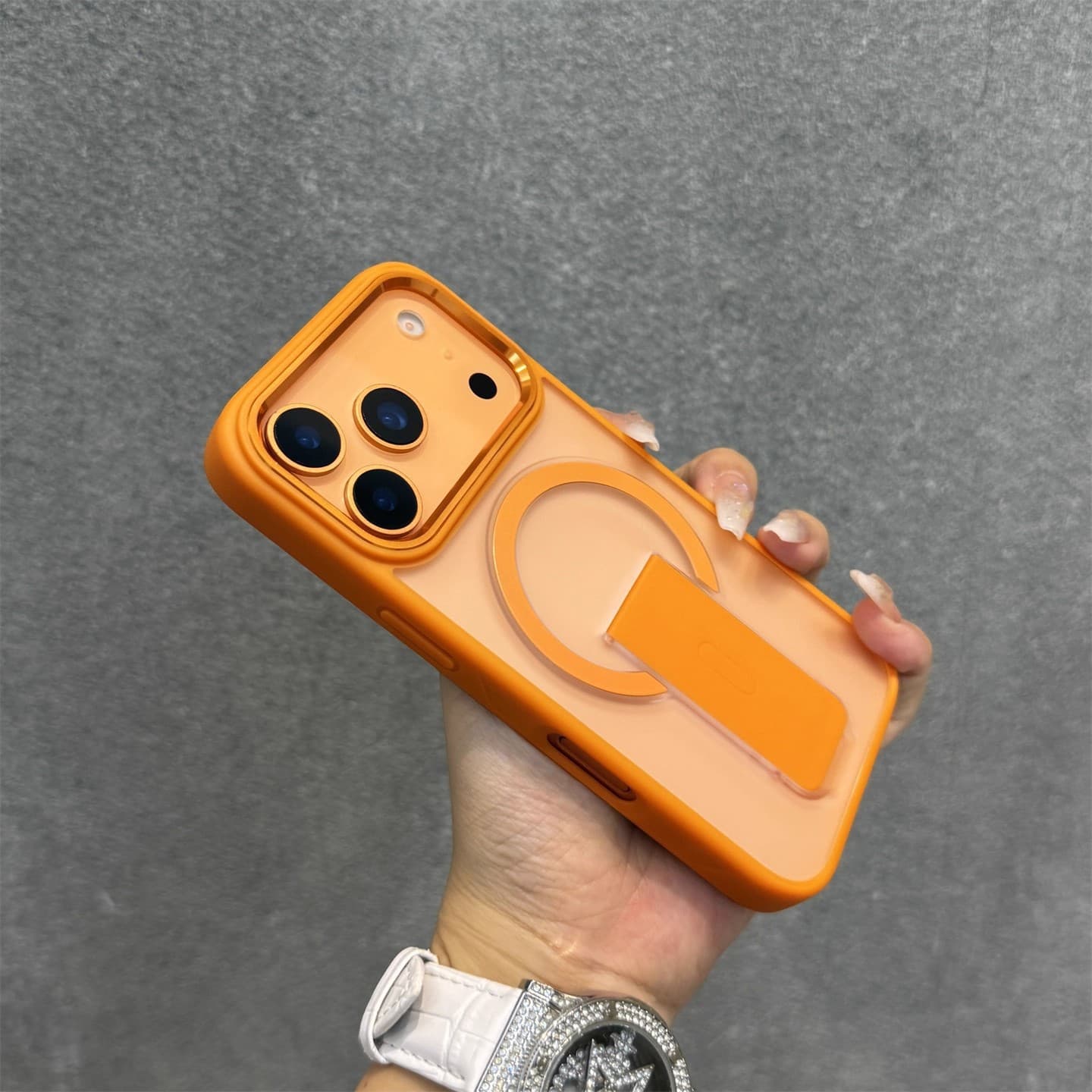 Xingyu Orange suitable for iPhone17promax mobile phone case folding magnetic stand Apple 14 all-inclusive metal large hole