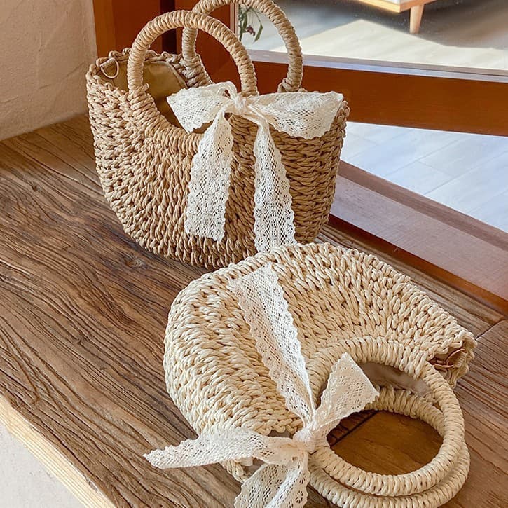 New woven bag niche design semi-circle straw bag casual vacation style beach bag hand-held crossbody bag for women