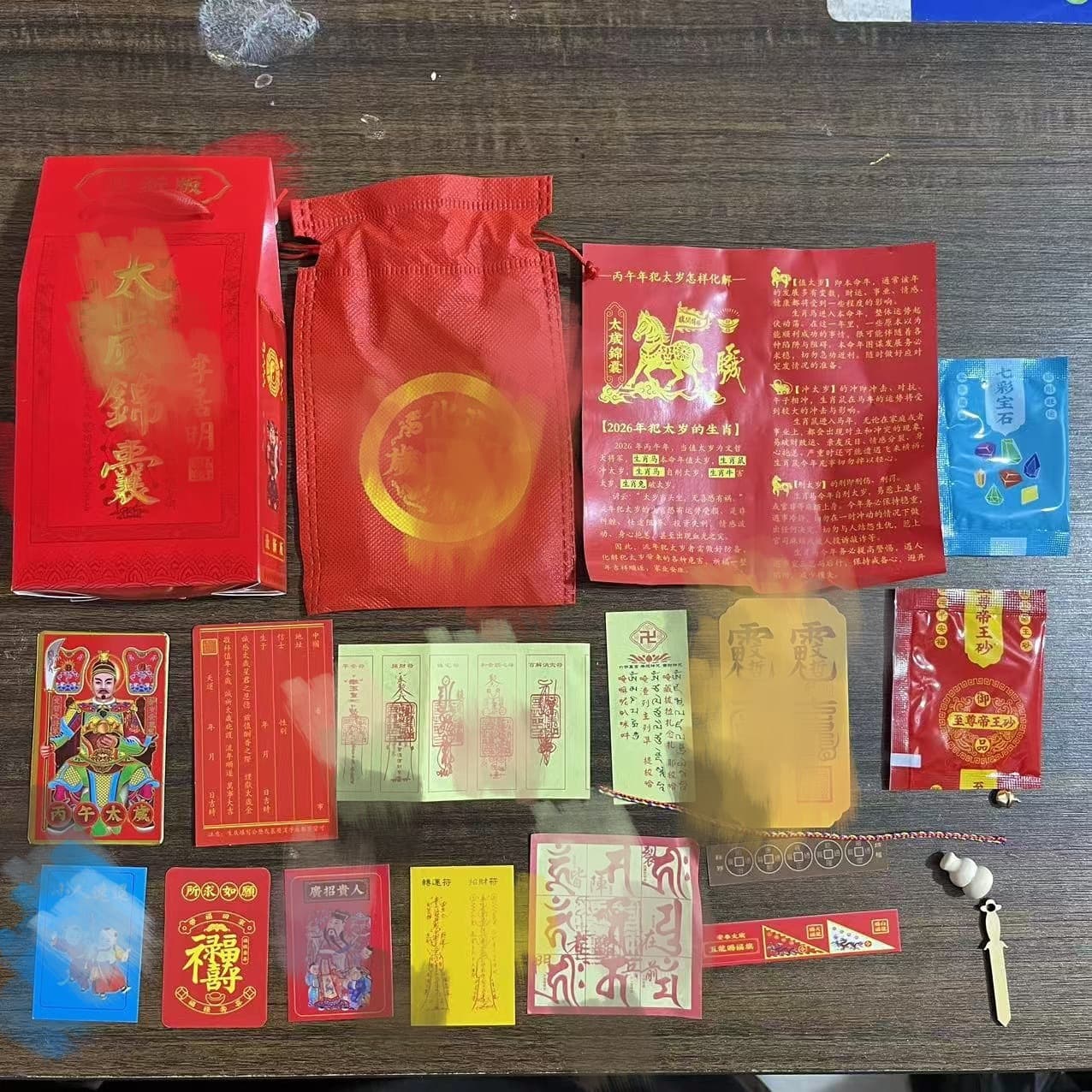 Wholesale 2026 Year of the Fire Horse zodiac breaking and resolving Tai Sui worship bag with burning paper amulet.