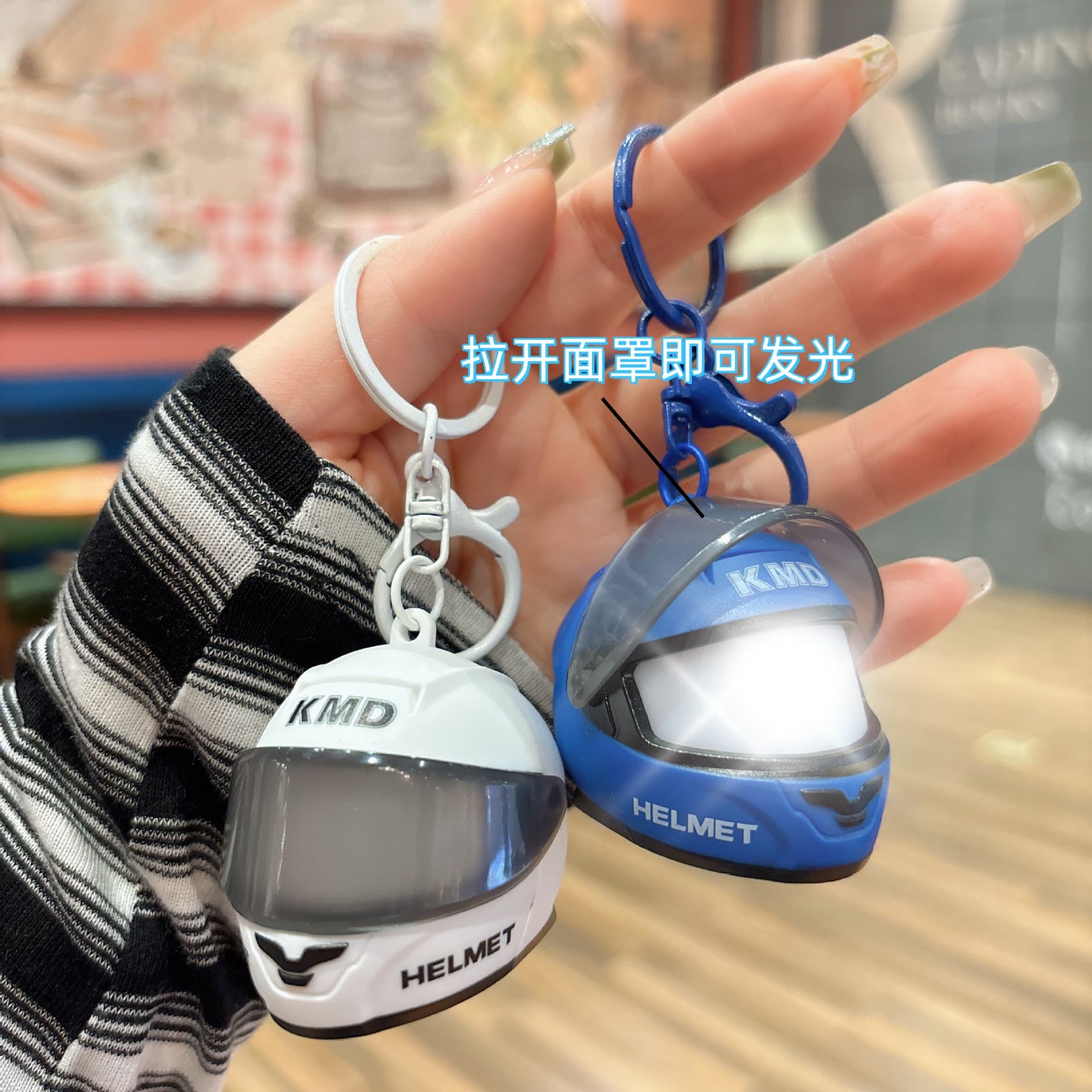 Creative luminous helmet shape keychain, fashionable personality, eye-catching couple bag charm, portable motorcycle accessories