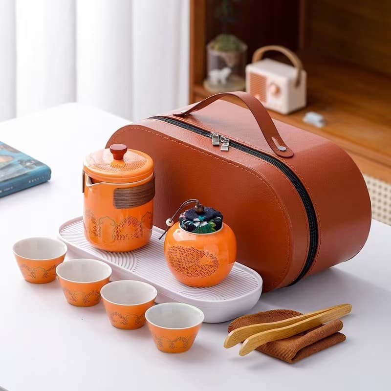 Wholesale of antique-style travel tea sets (one teapot, four cups, ceramic tea caddy, tea tray) as a Chinese New Year gift.