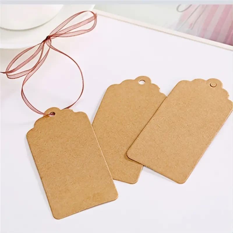 Kraft paper hang tags in stock, blank paper cards for clothing DIY labels, women's apparel tags, certificate birthday hang tags wholesale