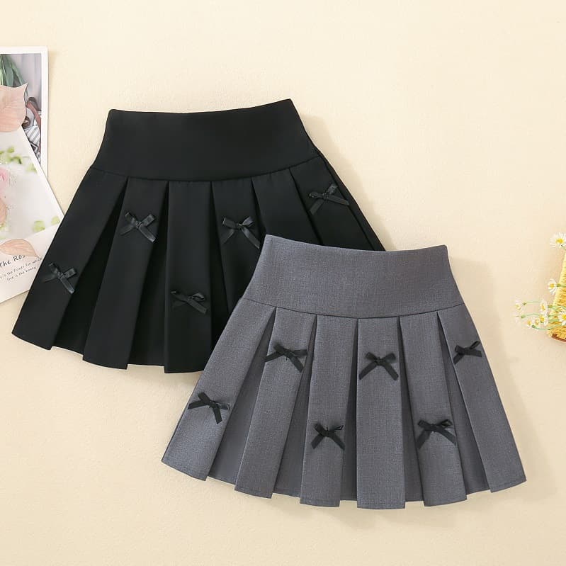 Girls' solid color pleated skirt autumn spring little girls' half skirt, 2025 children's versatile medium to large kids academy style short skirt.