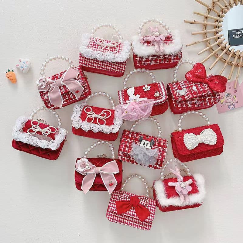 Stylish and cute crossbody bag for little girls, perfect for princess babies, in red for New Year's greetings.