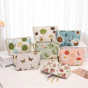 Cross-border canvas makeup bag, large-capacity hand-held toiletry organizer, printed zipper coin purse, student pencil case, in stock