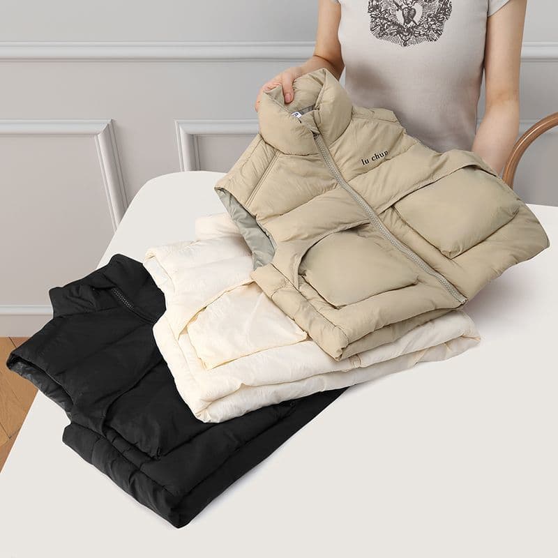 New autumn/winter children's down-filled cotton short vest, thickened outerwear for boys and girls, stylish outerwear for medium and large children.