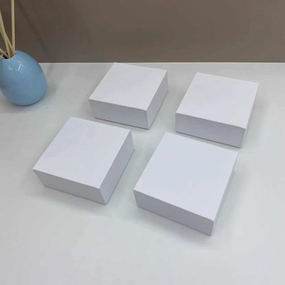 White top-and-bottom lid gift box for jewelry packaging, suitable for earrings, rings, pendants, and other accessories.