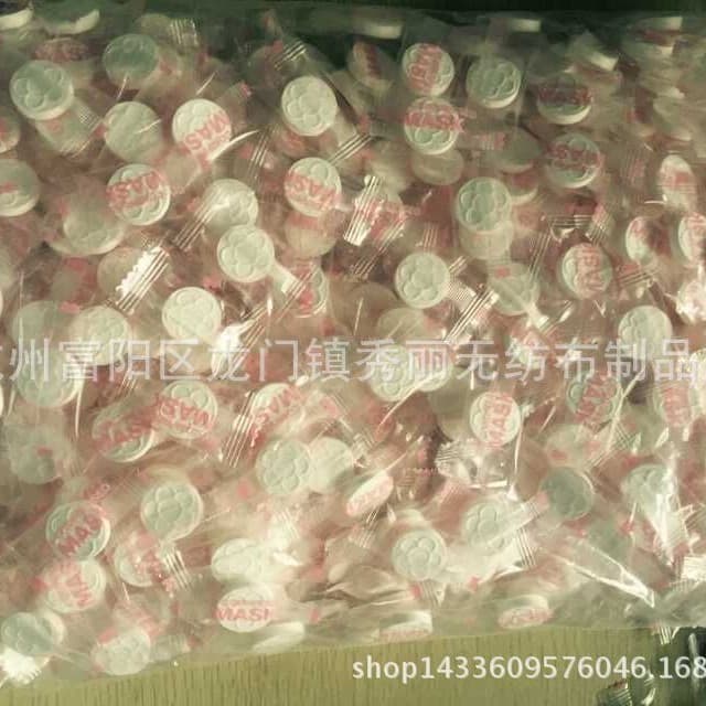 Factory direct sales of ultra-thin, candy-grain-like, disposable compressed facial masks, 500 sheets per pack, wholesale.