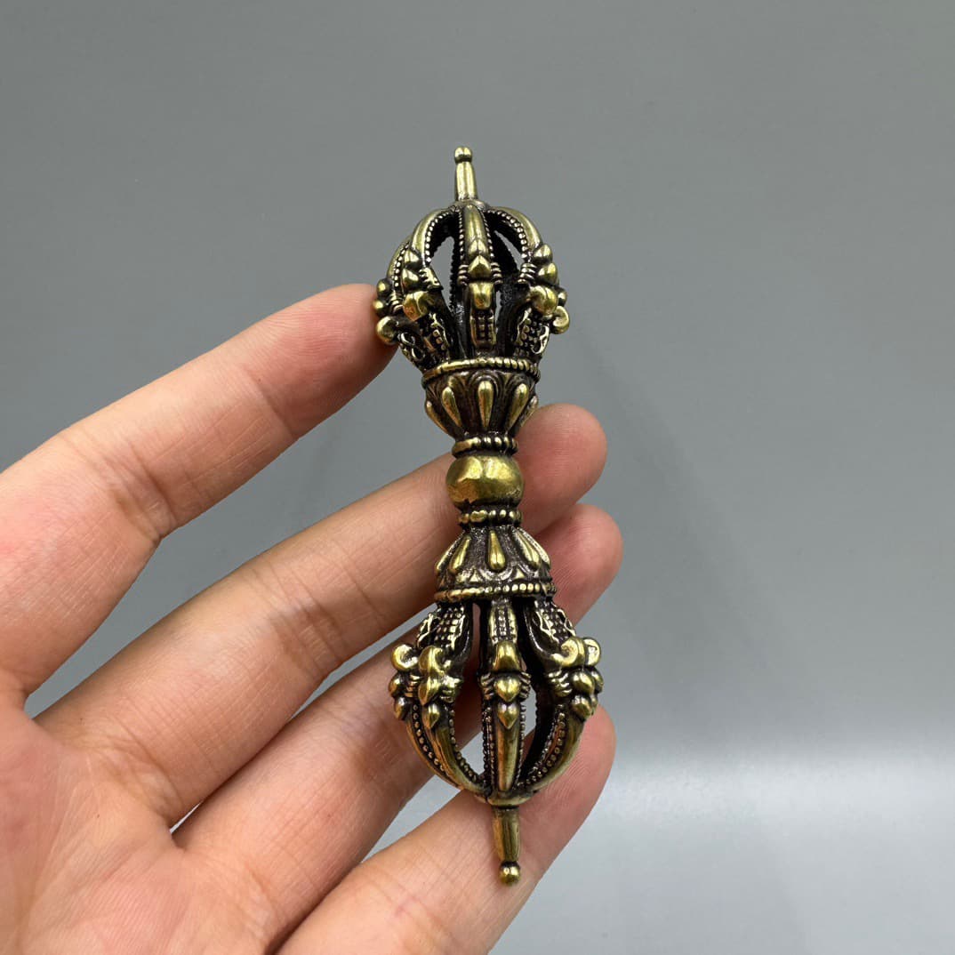 Small brass nine-pronged Vajra ritual treasure pestle, handheld collectible portable accessory, antique ornament