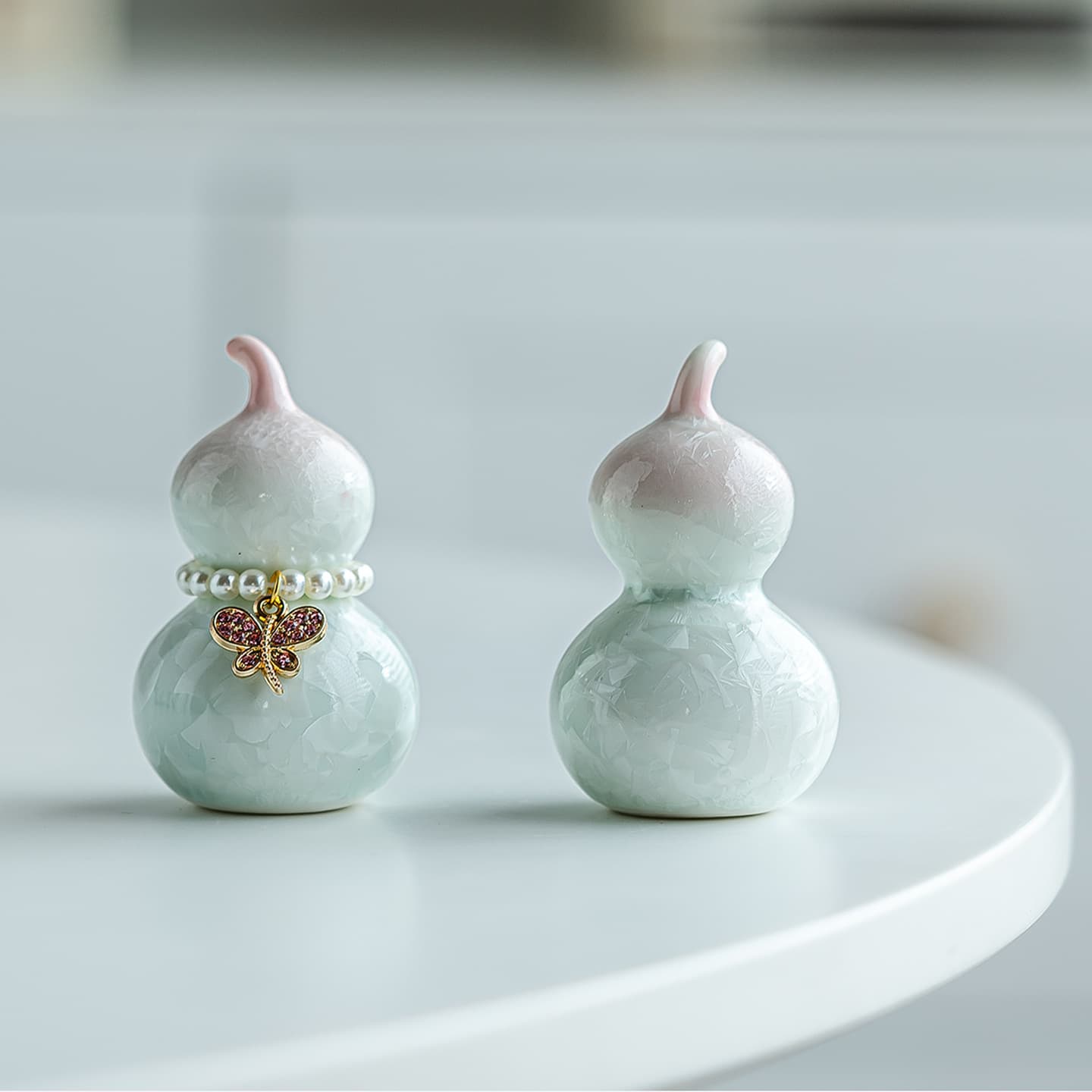 Crystalline glaze ceramic seven-color gourd tea pet ornament, home decoration, creative tea ceremony accessory, available for wholesale.