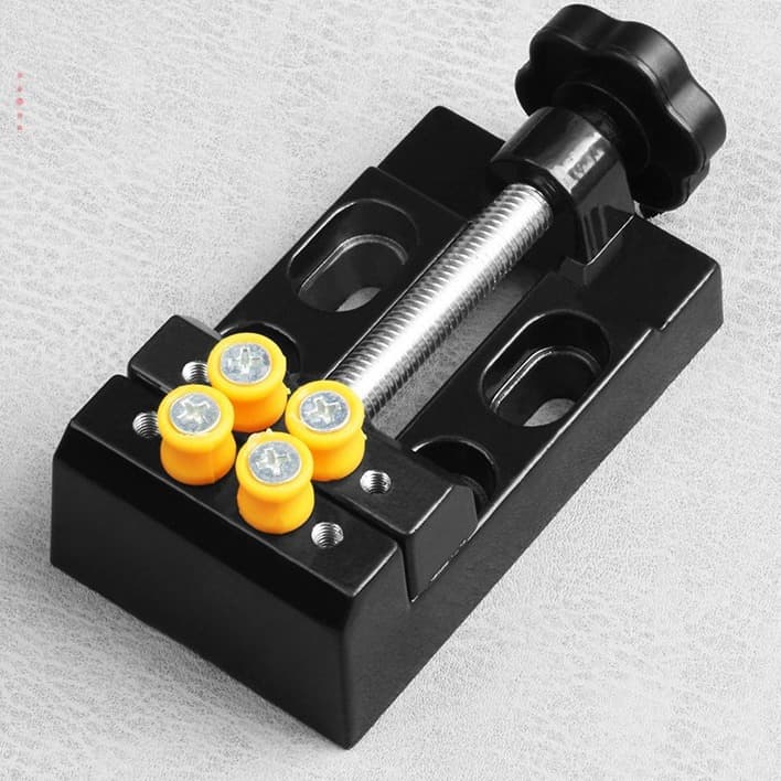 Aluminum alloy bench vise, mini DIY household flat-jaw pliers, multi-purpose pliers, small clamps for stable gripping and tightening.