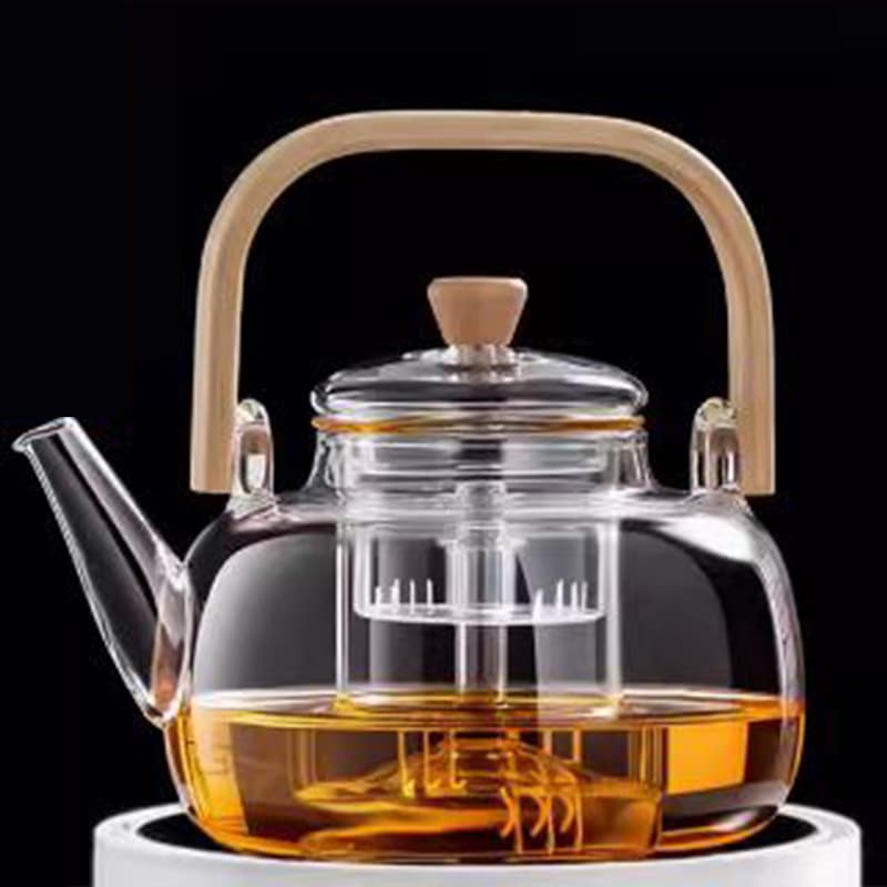 Manufacturer wholesale integrated steaming and brewing glass handle pot, tea-water separation brewing pot, home large capacity steaming and flower tea pot.