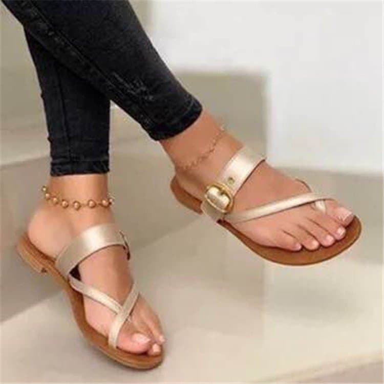 Foreign trade new flat-soled toe metal buckle large size slippers for women AliExpress supply hollow outer wear beach sandals and slippers