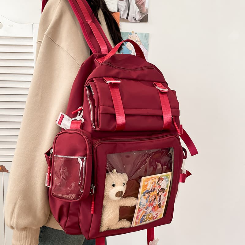 Japanese-style multi-pocket backpack for middle school, high school, and college girls, versatile roll-top transparent double-shoulder JK bag