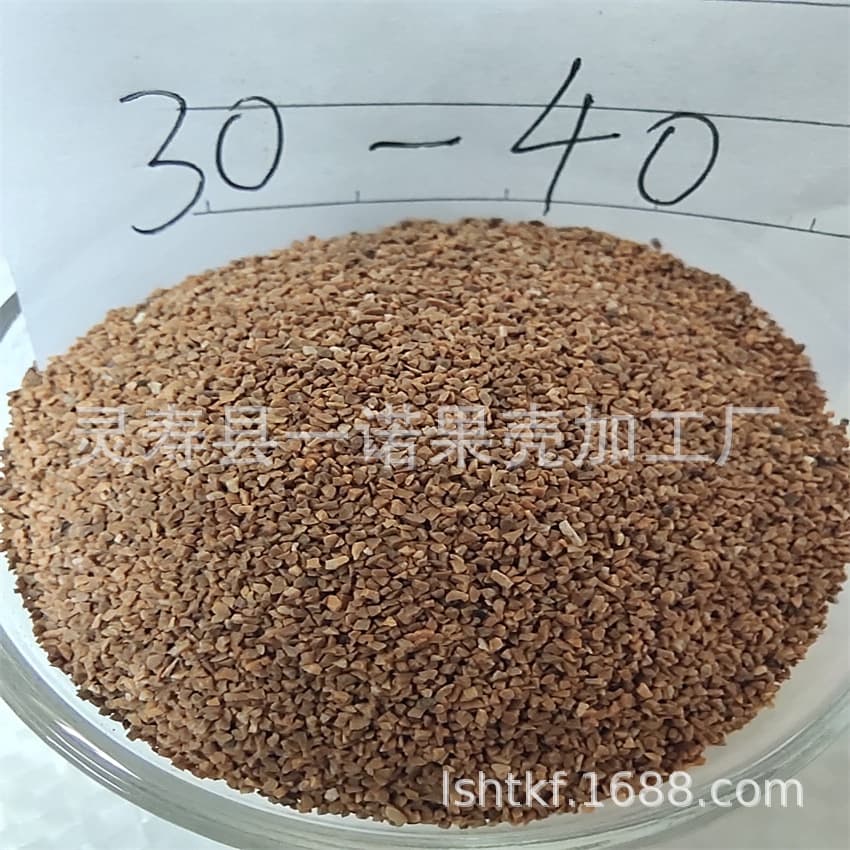 Manufacturer supplies apricot shell granules, apricot shell powder, and apricot shell powder. Custom specifications available. In-stock processing available. Fruit shell powder.