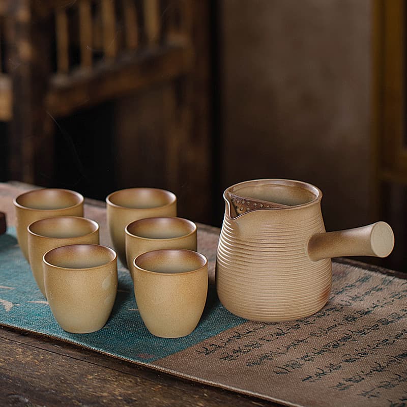 Charcoal-fired stove teaware set, retro rough ceramic teapot with handle and side handle, suitable for outdoor and home use, for warming tea.