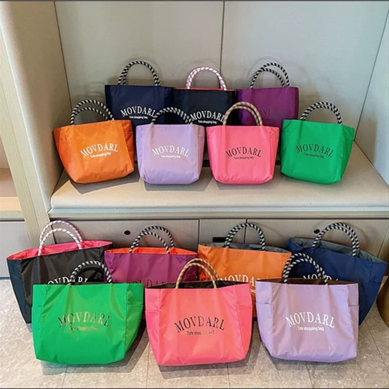 2026 new dopamine solid color waterproof cloth portable lunch box for commuting, portable handbag for outings, versatile mommy
