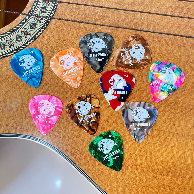 Source manufacturer celluloid guitar picks with perforation design suitable for ukulele plectrums