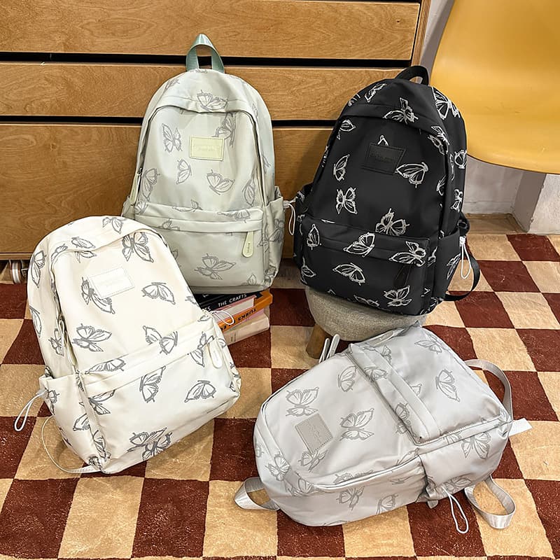 Japanese-style niche design butterfly backpack for women, versatile student school bag for college, casual travel backpack, laptop bag