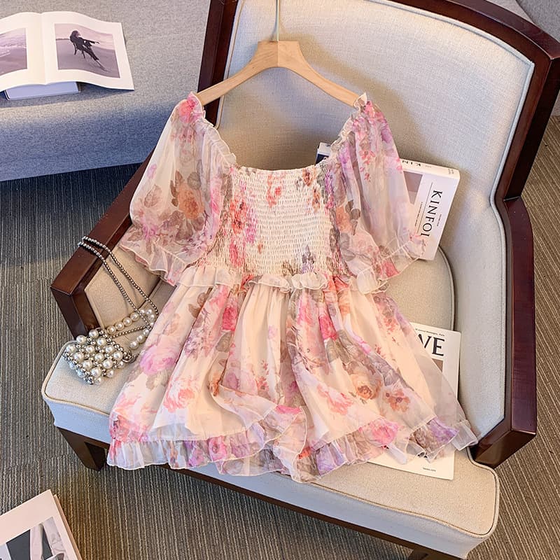 Plus-size women's clothing for 300 lbs, featuring a unique floral print top and dress with a French design, a niche style for summer 2024.