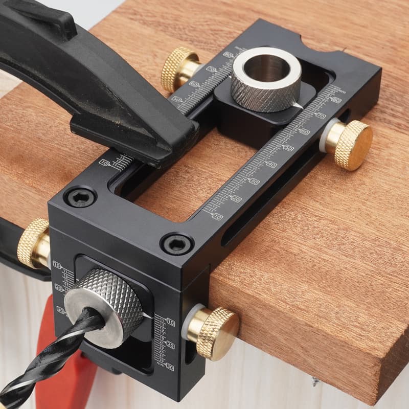 2-in-1 bed positioner, baby crib, Phillips head hole punch, bed and cabinet screws, woodworking tools.