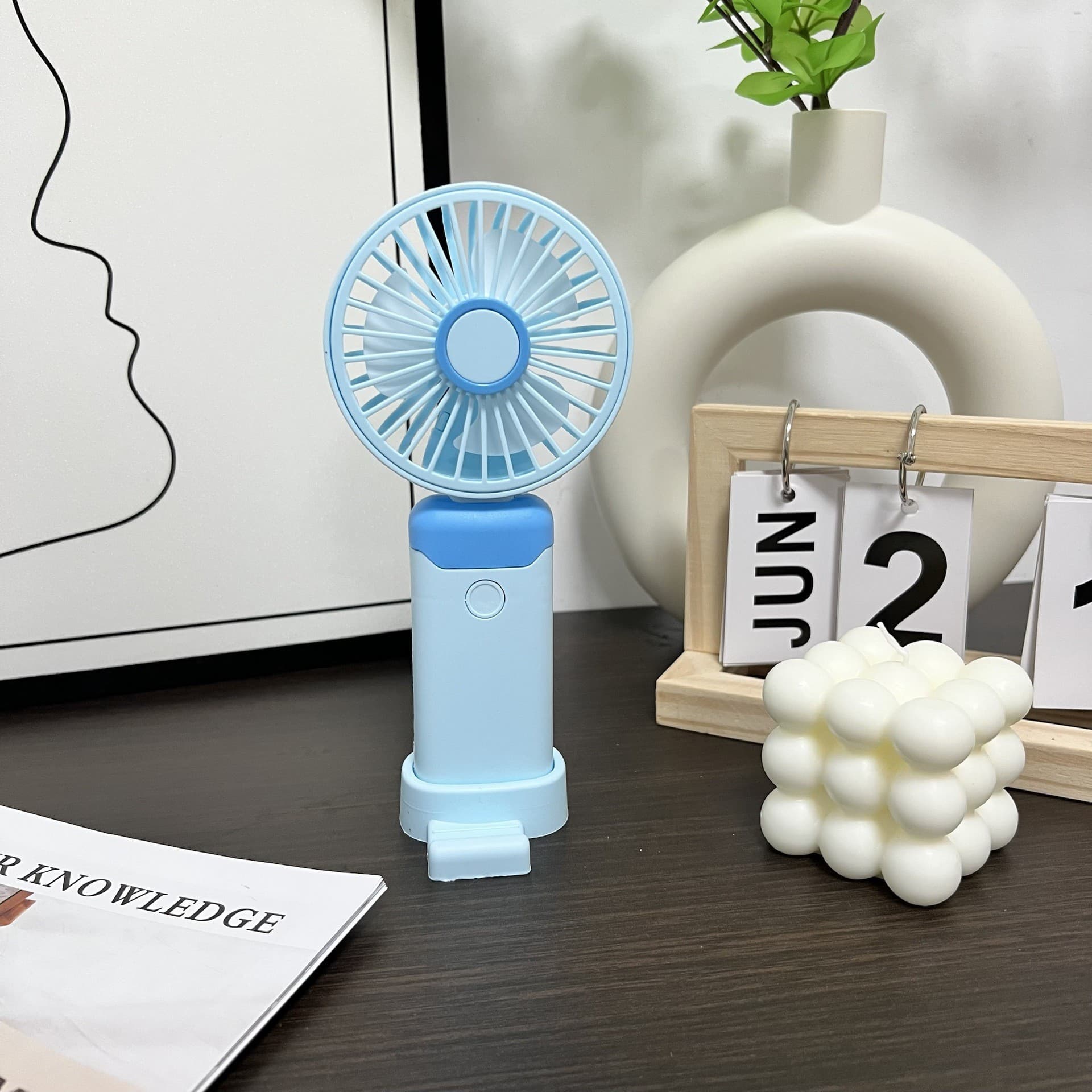 Simple handheld small fan with base mobile phone holder USB charging summer student portable electric gift fan
