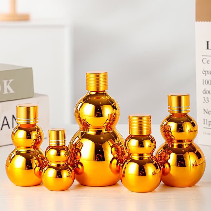 Supply wholesale cosmetic bottles, glass bottles, refill bottles, electroplated gold gourd essential oil bottles, glue head dropper bottles