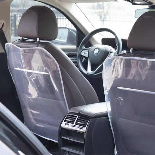 Transparent anti-stain mat for car seat backrests, made of PE film, designed to prevent children from kicking, slipping, or stepping on it.